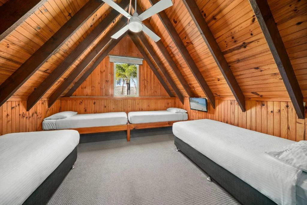 Spacious villa bedroom at NILORA Resort Port Macquarie